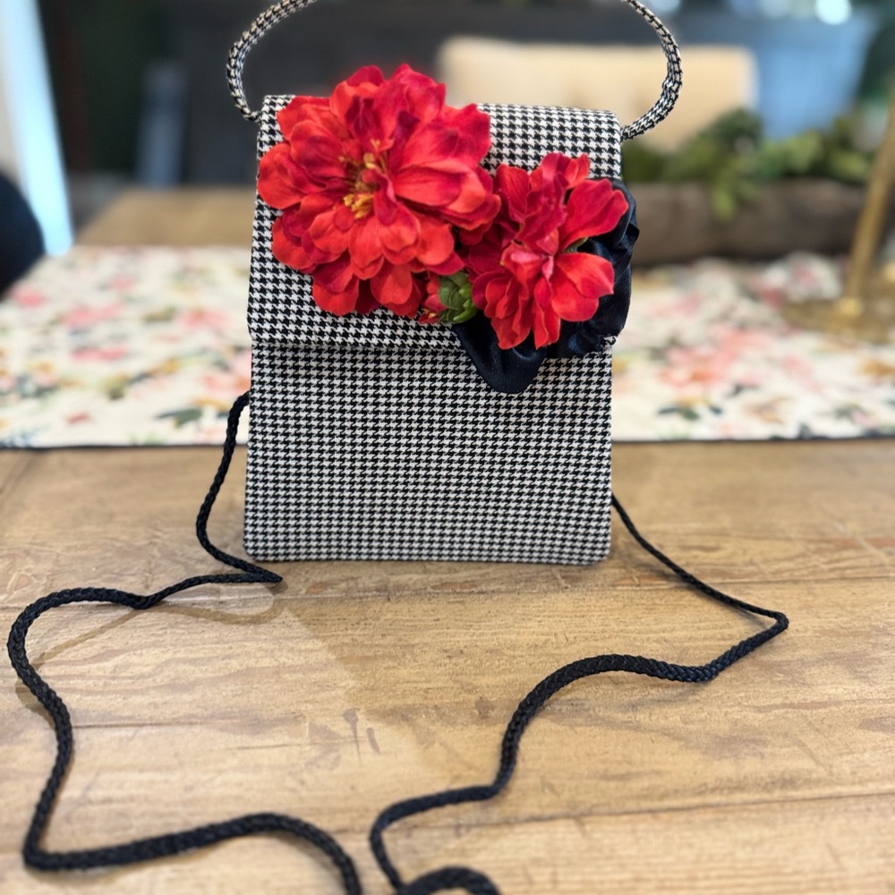 Elegant Black and White Houndstooth Bag with Red Floral Accent